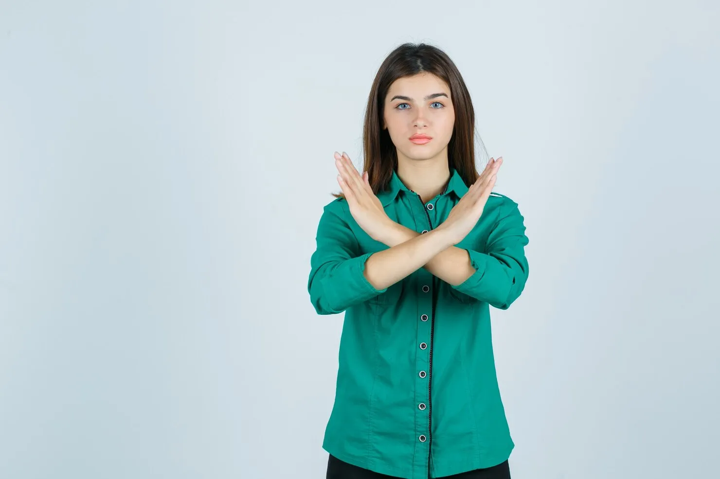 Refusal Woman making crossed arm gesture representing refusal charges